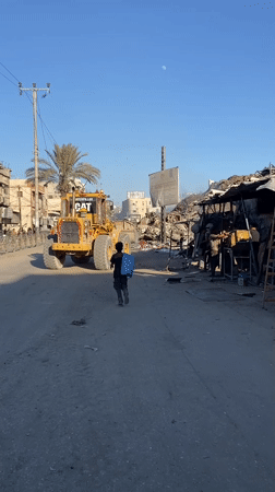 Scenes of debris, burning waste, and daily life in Gaza