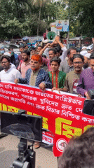Morning protest with red banners unfolds across Dhaka streets