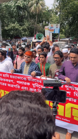 Morning protest with red banners unfolds across Dhaka streets