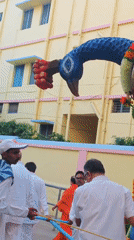 Colorful floats and procession fill the streets of Puttaparthi
