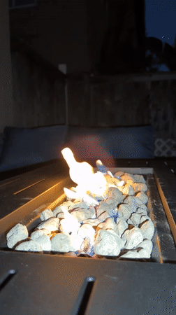 Fire pit glowing and neighborhood mailboxes, Aliso Viejo night
