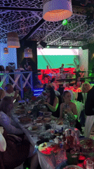 Live band performs with Bulgarian flag backdrop in Plovdiv venue