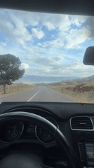 Driver documents scenic mountain road journey near Ouaouizert, Morocco