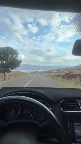 Driver documents scenic mountain road journey near Ouaouizert, Morocco