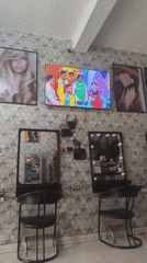 Inside a North Jakarta hair salon with a game show on TV