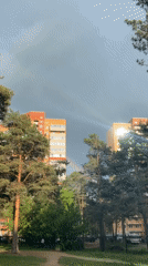Rainbow appears over Dmitrov apartment buildings amid daily life