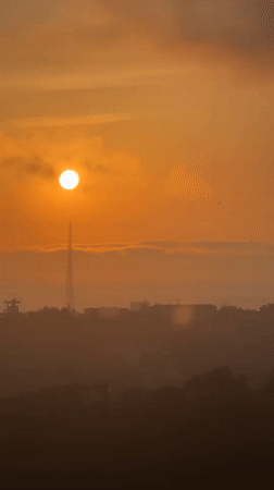 Sochi resident captures sunrise cityscape views from balcony