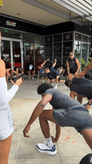 Group holds sidewalk yoga session in West Hollywood