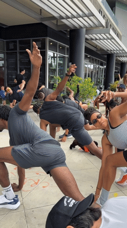Group holds sidewalk yoga session in West Hollywood
