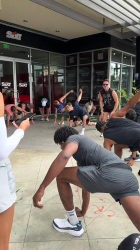 Group holds sidewalk yoga session in West Hollywood