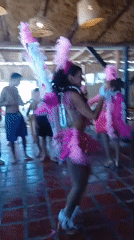 Colorful dance performance at beachside venue in Porlamar, Venezuela