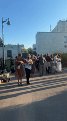 Afternoon park gathering features dancing, photos in Saint Petersburg