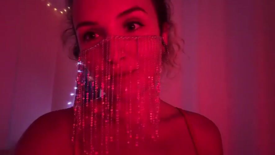 Masked portraits and red lighting in Baan Bang Rak