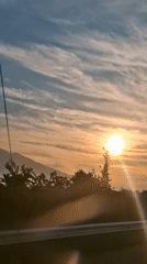 Sunrise time-lapse over Indonesian mountain landscape