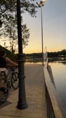 Golden hour along Madrid's waterfront at dusk