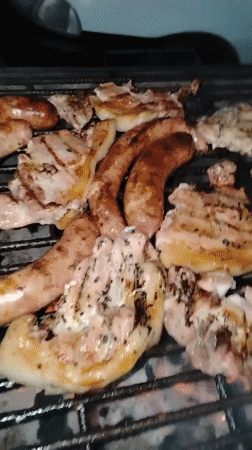 Late-night grilling session captured in Tinaquillo, Venezuela
