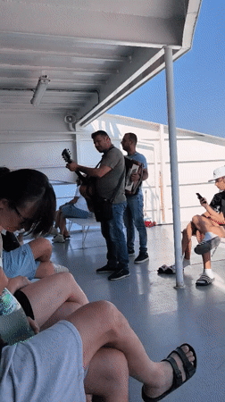Live acoustic music on a ferry deck off Greece