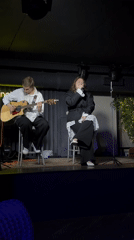 Musical duo performs at Krasnoyarsk bar during afternoon set