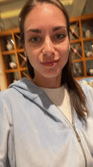 Woman dines at restaurant in Prijevor, Montenegro
