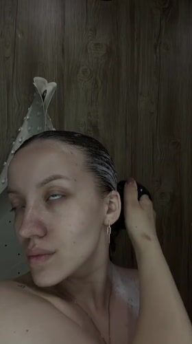 Woman's private bathing moments documented in Reshetnikovo, Russia