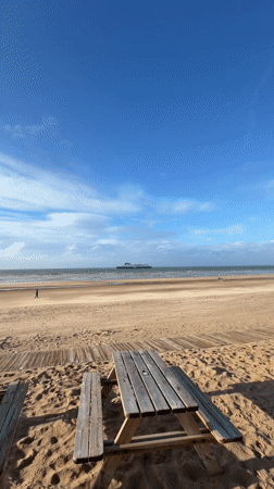 Casual beach event with DJ and picnic setup, Sangatte