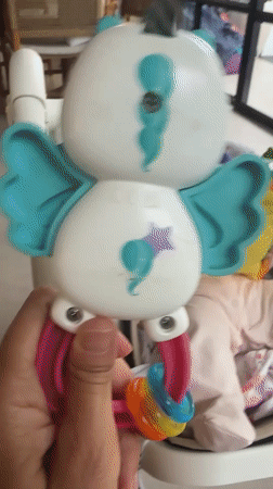 Baby care moments documented in Mengwi home with toys