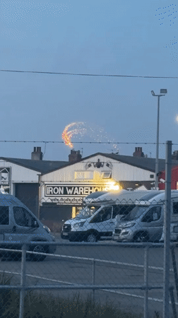 Fireworks light up the sky above Great Yarmouth at dusk
