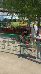 Family enjoys morning amusement park outing in Chaikovsky, Russia