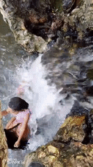 Families enjoy evening swim at Tinaquillo waterfall recreation area