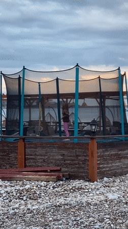 Child plays on trampoline in Bar, Montenegro