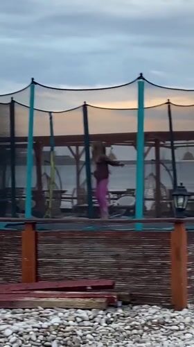 Child plays on trampoline in Bar, Montenegro