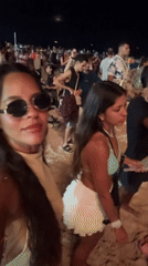 Nighttime beach party draws crowds in Rio de Janeiro