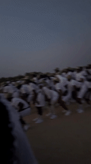 Coordinated group gathers for early morning outdoor event in Maiduguri