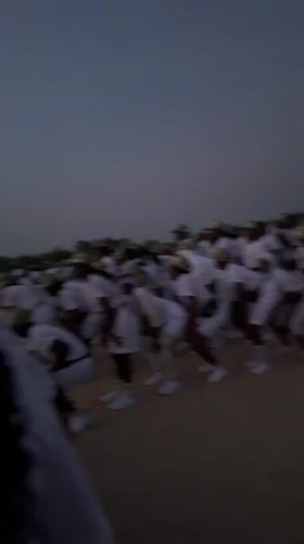 Coordinated group gathers for early morning outdoor event in Maiduguri