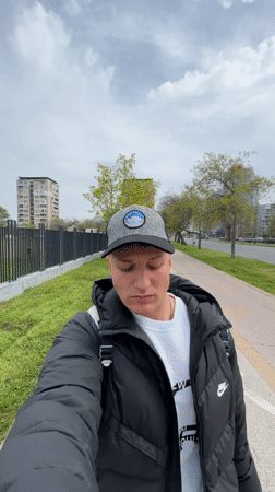 Young man takes selfies during walk in Plovdiv