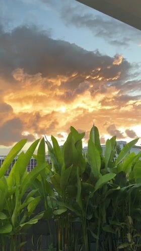 Vivid sunset over Kuta Selatan from a resort terrace