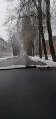 Driver records view through windshield from inside vehicle