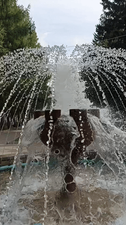 Summer morning at a Novosibirsk park and fountain square