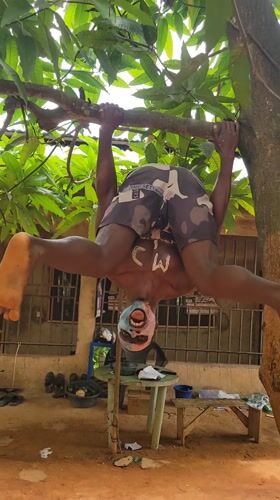 Face-painted performer documented in Nigerian towns over 16 minutes