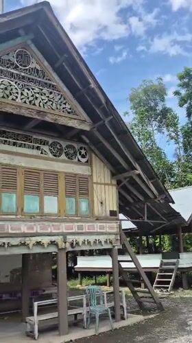 Traditional wooden architecture documented in Indonesian village