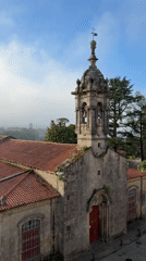 Historic stone church with bell tower documented in Santiago