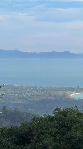Afternoon at a scenic hilltop bar overlooking Ko Samui's coast