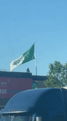 Franco-Ontarian flag flies on sunny day in Ottawa