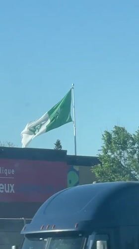 Franco-Ontarian flag flies on sunny day in Ottawa