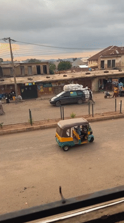 Busy street activity captured in Bukuru, Nigeria commercial district