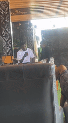 Afternoon hangout at an outdoor bar in Howayi, Nigeria