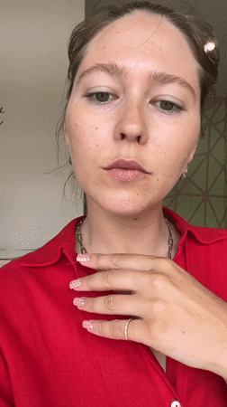 Woman gets polka dot manicure in Podgorica salon