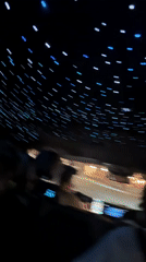 Starlit car interior captured during nighttime Paris drive