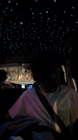 Starlit car interior captured during nighttime Paris drive