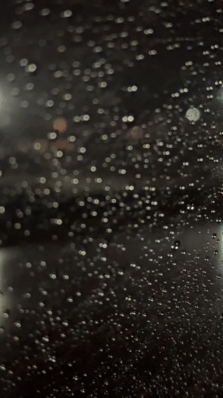 Nighttime rainfall documented on window in Huejotzingo, Mexico